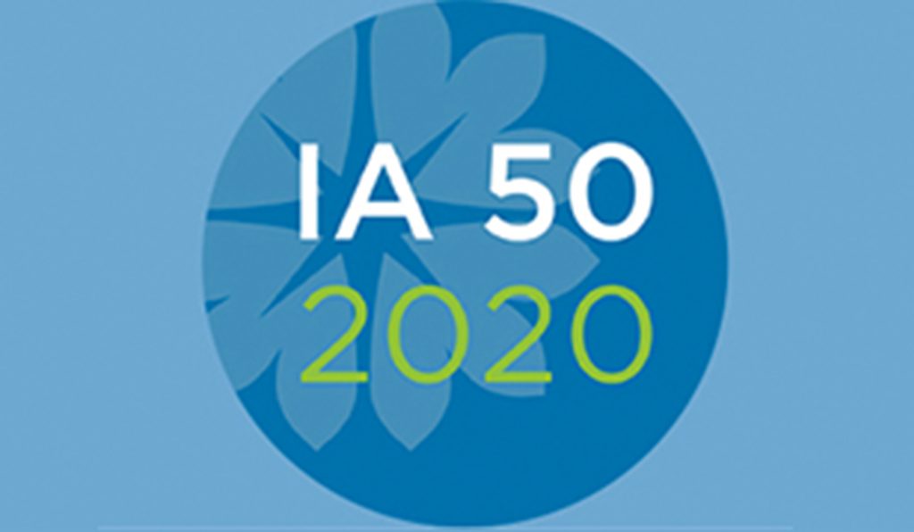 logo of a blue circle with flower and the text IA 50 2020